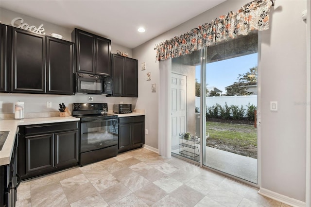 kitchen with black appliances