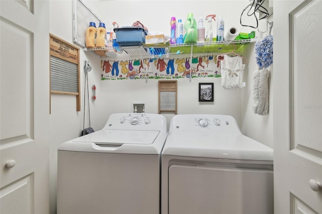 washroom featuring independent washer and dryer