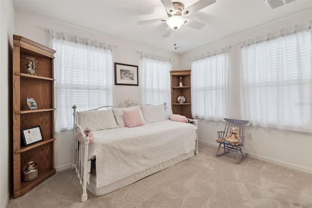 carpeted bedroom with ceiling fan