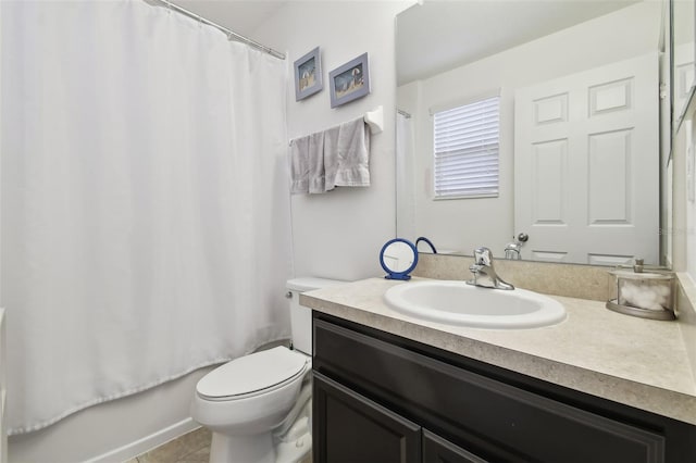 full bathroom with vanity, toilet, tile patterned flooring, and shower / bath combo with shower curtain