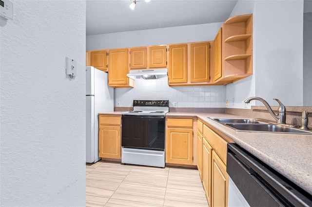 kitchen with dishwasher, white fridge, sink, light tile patterned flooring, and range with electric stovetop