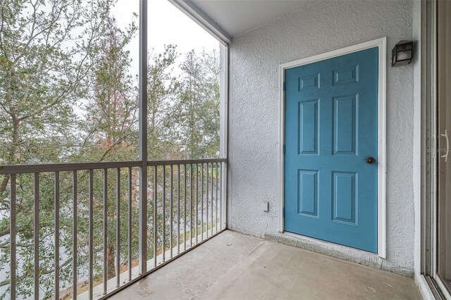 doorway to property with a balcony