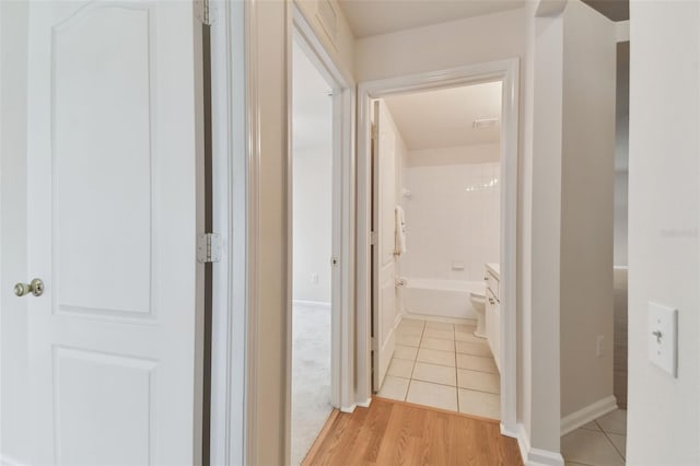 hallway featuring light hardwood / wood-style floors