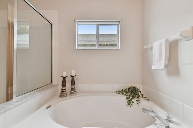 bathroom with a bathing tub