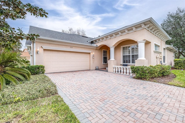 view of front of home with a garage