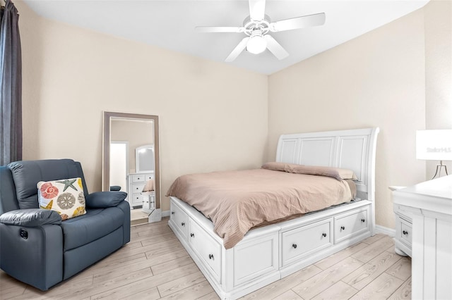 bedroom featuring ceiling fan and light hardwood / wood-style flooring