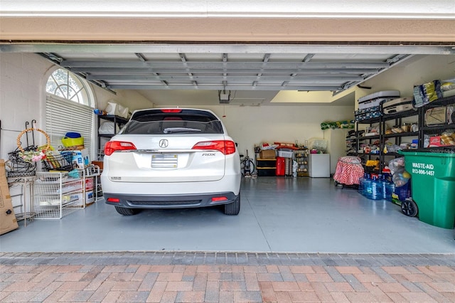 garage featuring a garage door opener