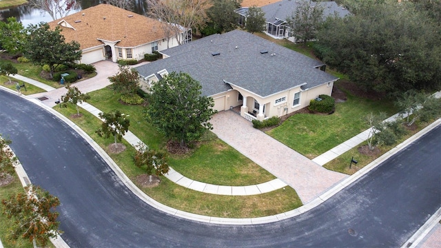 drone / aerial view featuring a water view