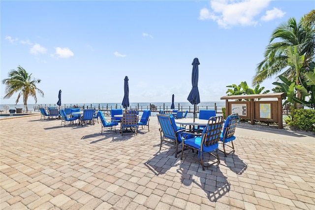 view of patio / terrace with a water view