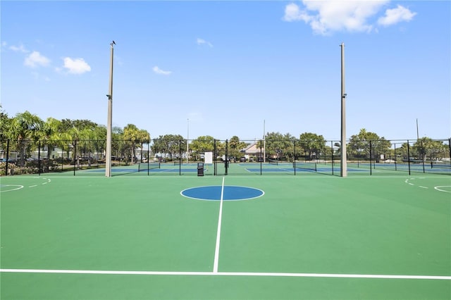 view of sport court featuring tennis court