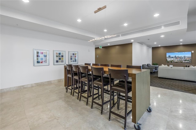 bar featuring decorative light fixtures