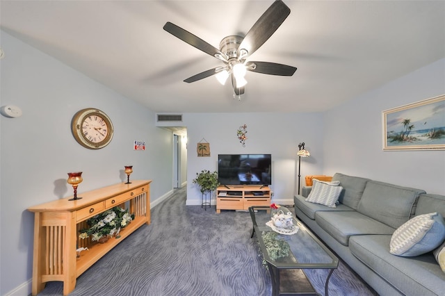 carpeted living room with ceiling fan