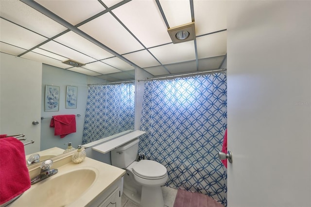 bathroom with toilet, a shower with shower curtain, vanity, and tile patterned flooring