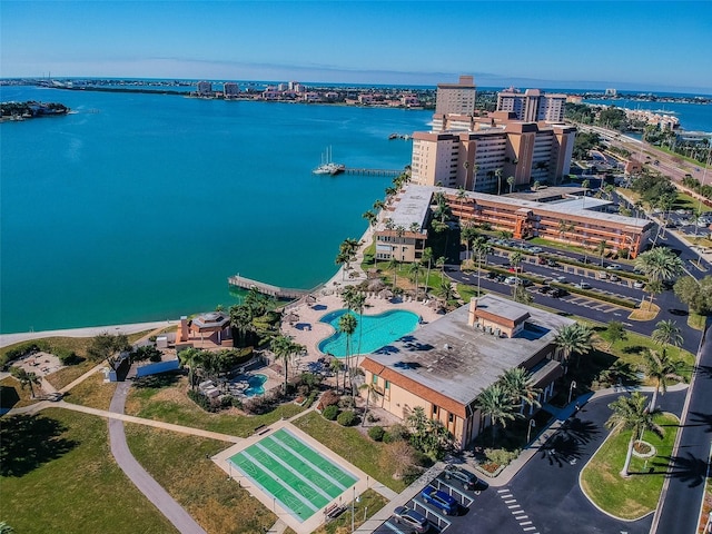 birds eye view of property with a water view