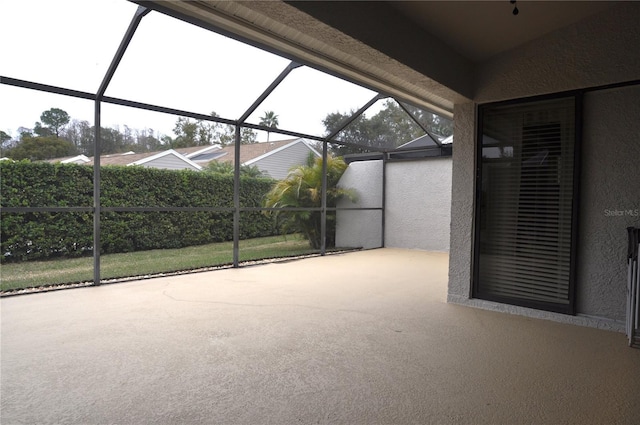 view of patio / terrace with a lanai