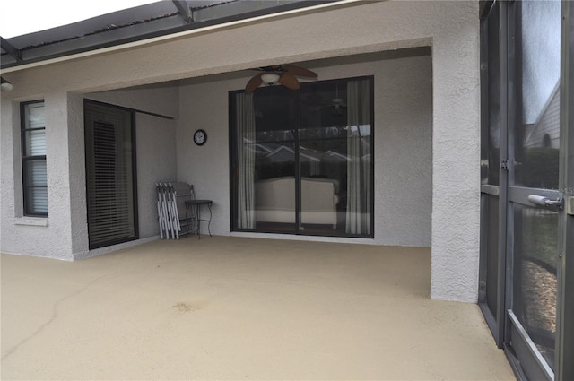 view of patio with ceiling fan