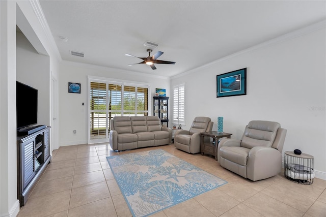 tiled living room featuring ceiling fan and ornamental molding