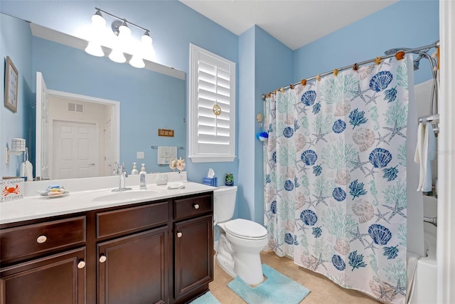 full bathroom featuring toilet, vanity, and shower / bath combo with shower curtain