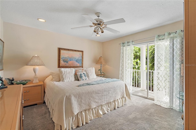 carpeted bedroom with ceiling fan and access to outside