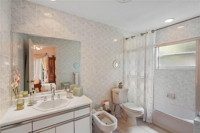 full bathroom featuring vanity, bathing tub / shower combination, a wealth of natural light, and tile patterned floors