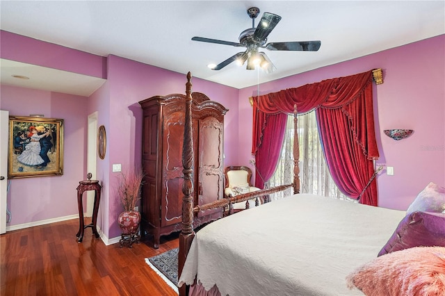 bedroom with dark wood-type flooring and ceiling fan