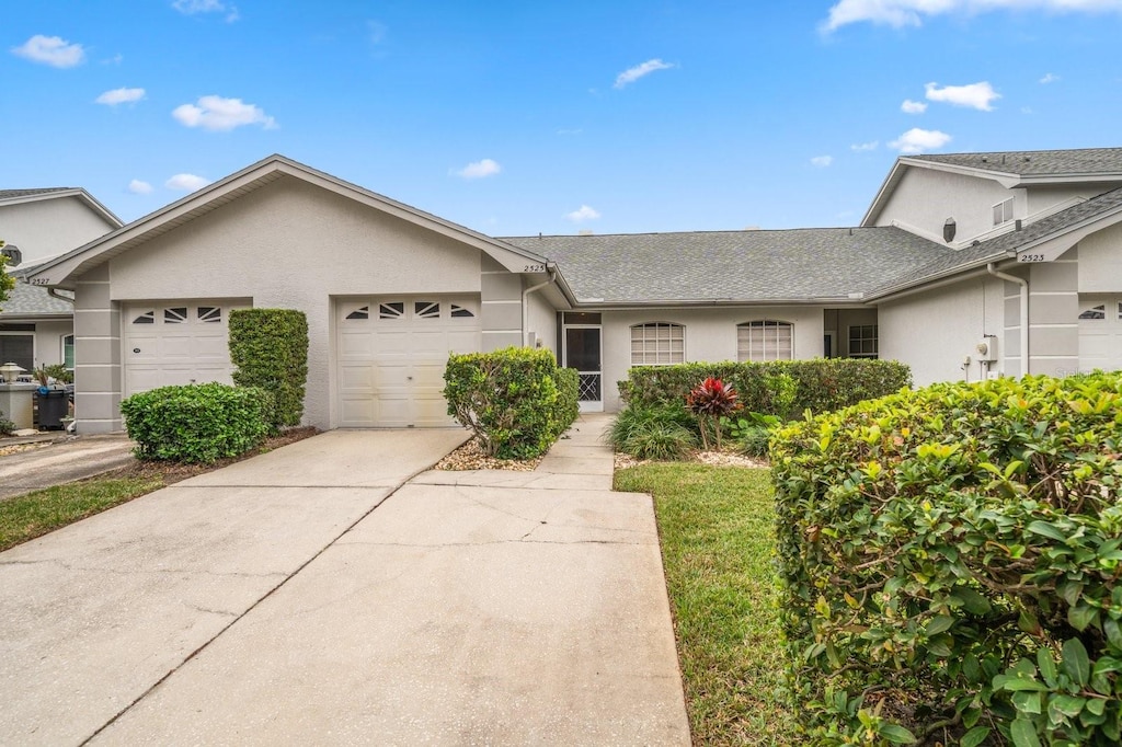 view of front of property featuring a garage