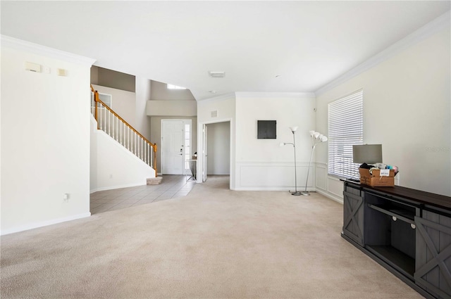 carpeted living room featuring ornamental molding