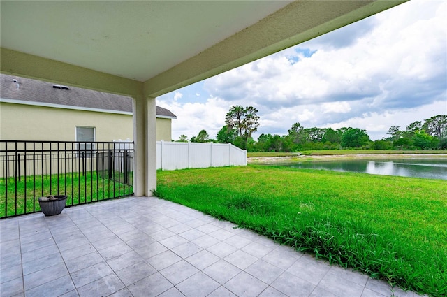 view of patio / terrace with a water view