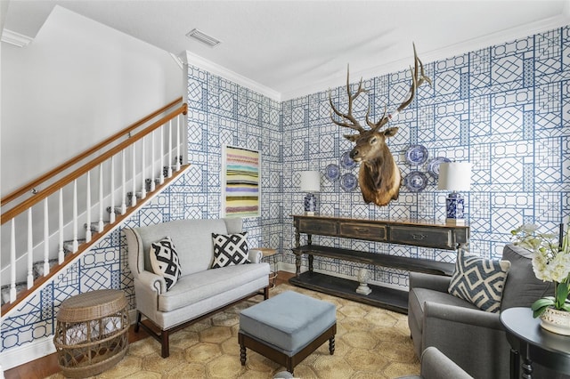 living room with ornamental molding