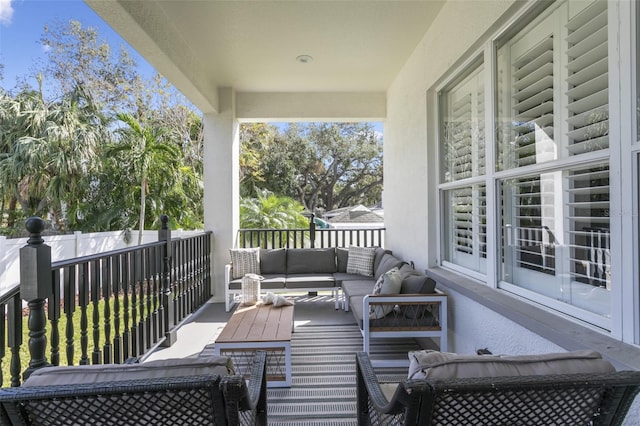 wooden terrace featuring outdoor lounge area