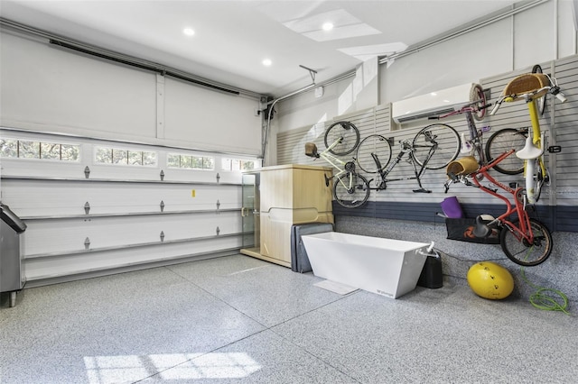 garage with an AC wall unit