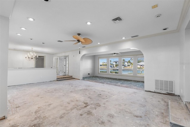 unfurnished living room featuring crown molding and ceiling fan with notable chandelier