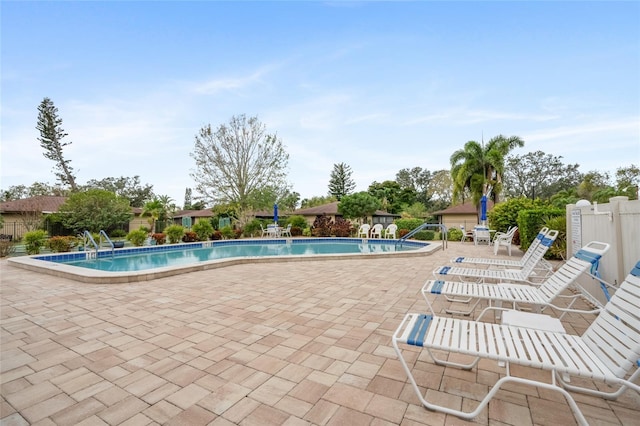 view of swimming pool featuring a patio