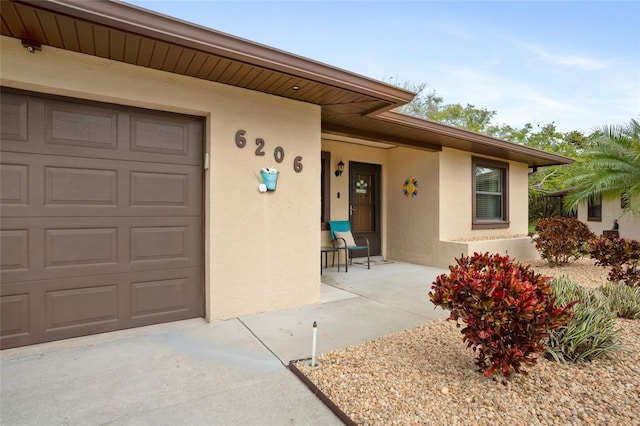 entrance to property featuring a garage