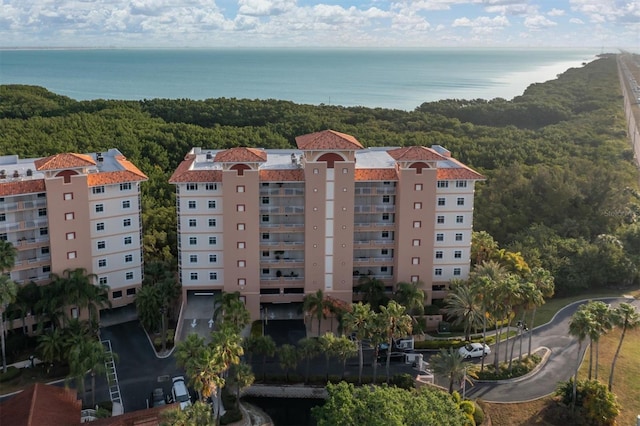 view of property with a water view