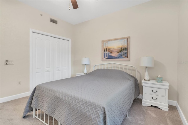 bedroom featuring carpet flooring, a closet, and ceiling fan