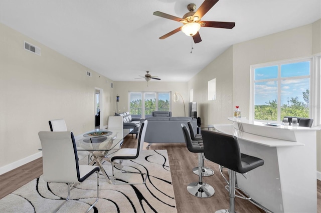 12077 Gandy Blvd N Unit 344, Saint Petersburg, FL 33702 - dining area with wood finished floors, ceiling fan, and baseboards