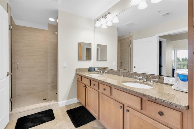 12077 Gandy Blvd N Unit 344, Saint Petersburg, FL 33702 - bathroom with double vanity, a shower stall, and tile patterned floors