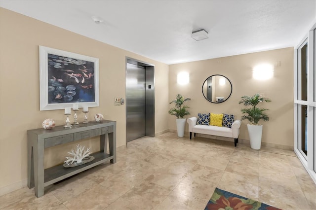 12077 Gandy Blvd N Unit 344, Saint Petersburg, FL 33702 - hall featuring elevator and baseboards