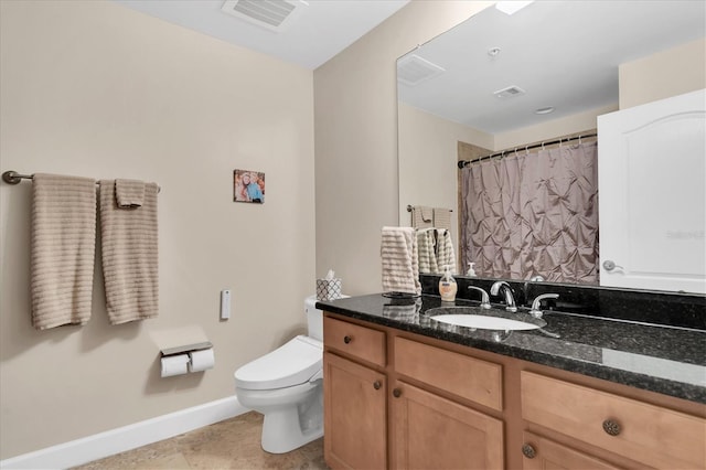 12077 Gandy Blvd N Unit 344, Saint Petersburg, FL 33702 - full bath with baseboards, vanity, toilet, tile patterned floors, and curtained shower