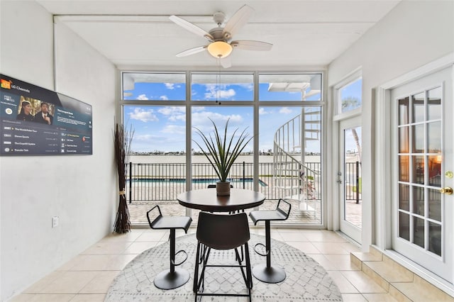 sunroom / solarium with ceiling fan