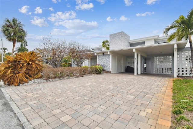 view of front of property with a carport