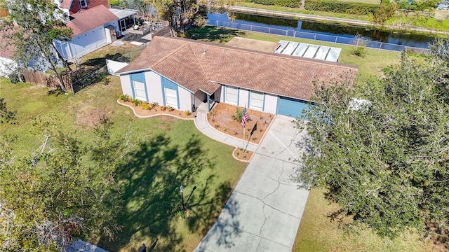 drone / aerial view featuring a water view