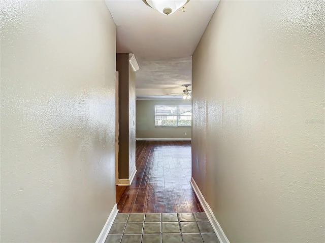 hall with dark hardwood / wood-style flooring