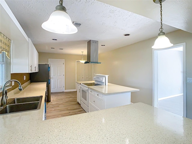 kitchen featuring sink, island range hood, hanging light fixtures, white electric stove, and white cabinets