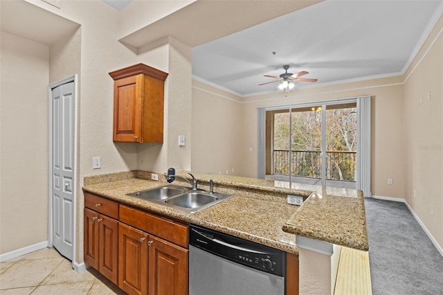 kitchen featuring dishwasher, sink, ornamental molding, light colored carpet, and light stone countertops