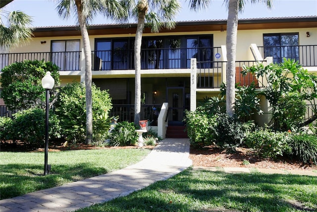 exterior space with a front yard