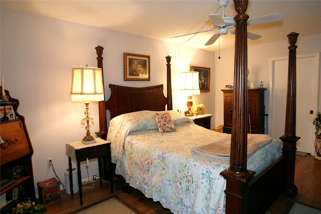 bedroom featuring dark hardwood / wood-style floors and ceiling fan