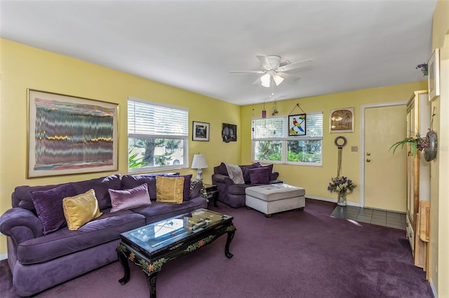 living room with ceiling fan and carpet flooring