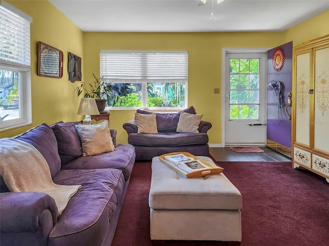 tiled living room with carpet floors